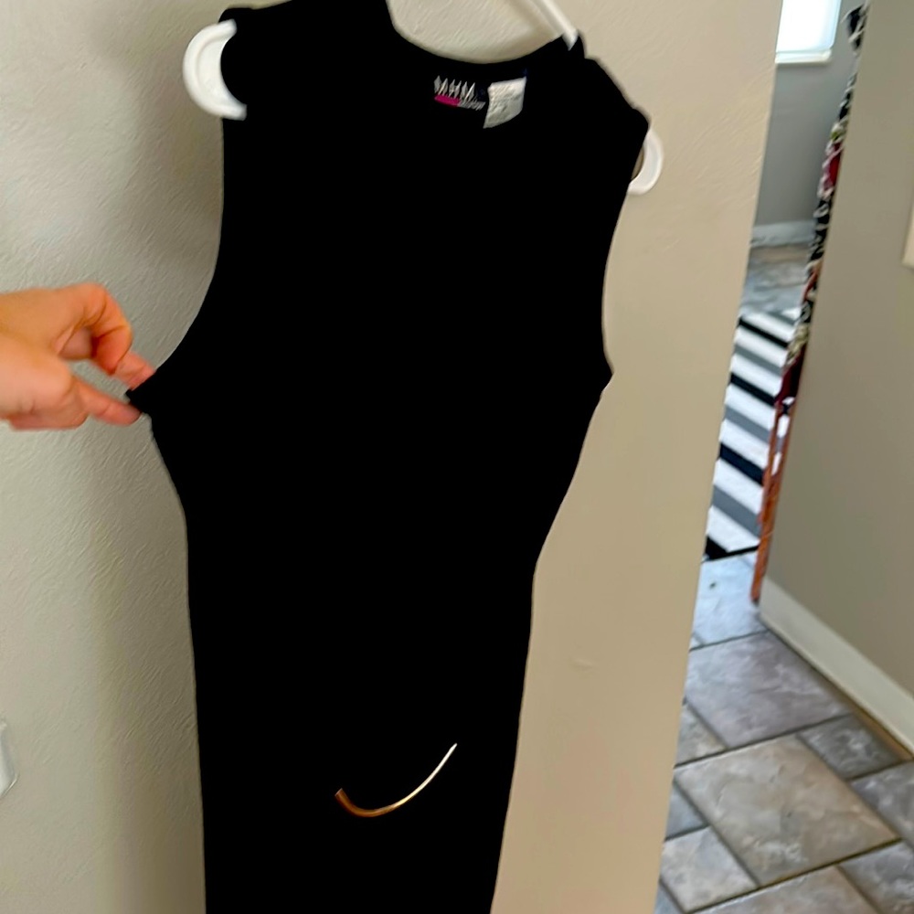 Black sleeveless sweater dress with cute 90s style belt